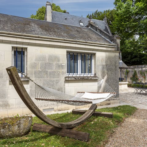 Settle on the hammock to read holiday romance novels in the sun