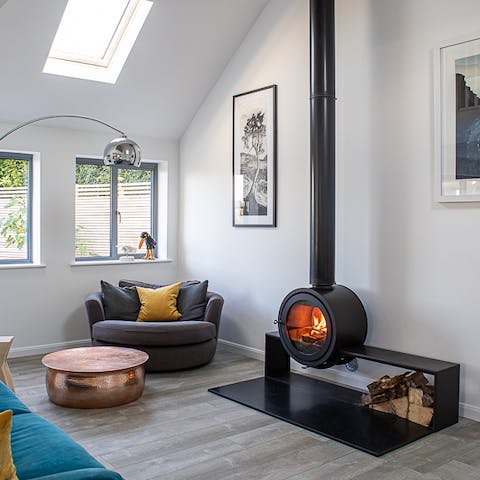 Get toasty and warm next to the contemporary wood-burning stove