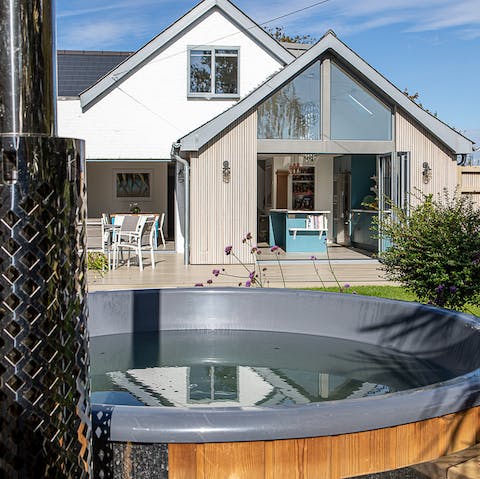 Start up the wood-fired hot tub and relax amid the bubbles