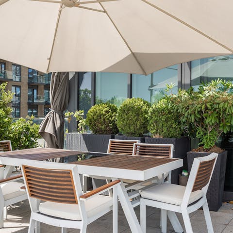 Enjoy a delicious alfresco meal on the private rooftop