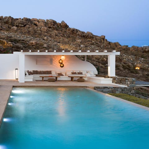 Take a twilight dip in the sparkling swimming pool