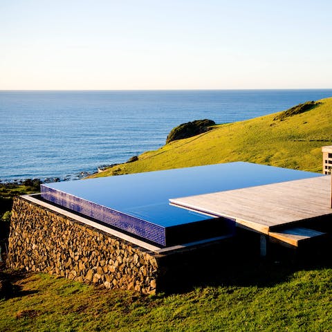 Go for a dip in the infinity pool overlooking the sea