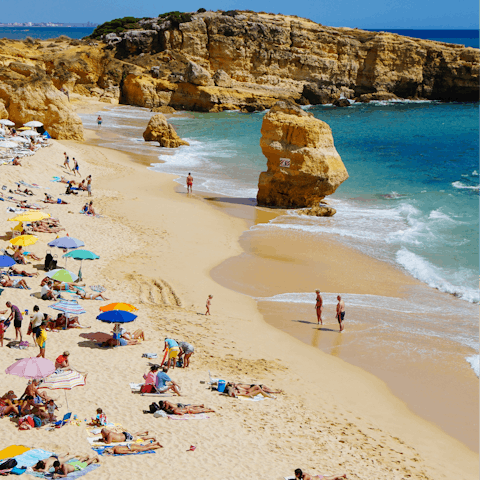 Head to the sandy shores of Praia do Castelo, just a short drive from your villa