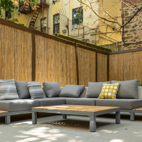 Take a pause from your city adventures in private yard