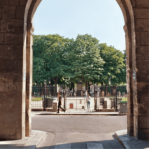 Stroll over to Place des Vosges, a short walk away