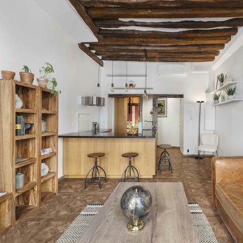 Nibble brie under the wooden beams in the living area