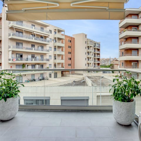 Take five on the covered terrace after a busy day of exploring