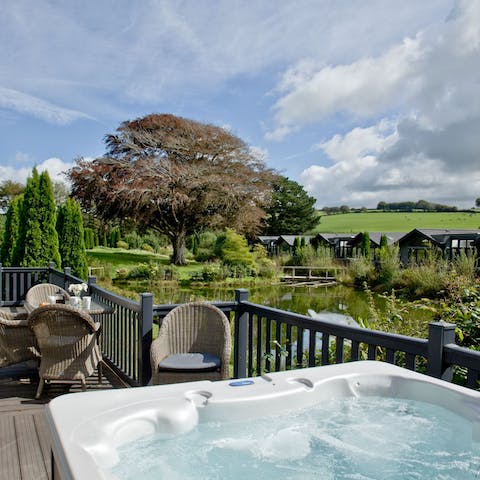 Relax in your private hot tub and gaze out over the grounds
