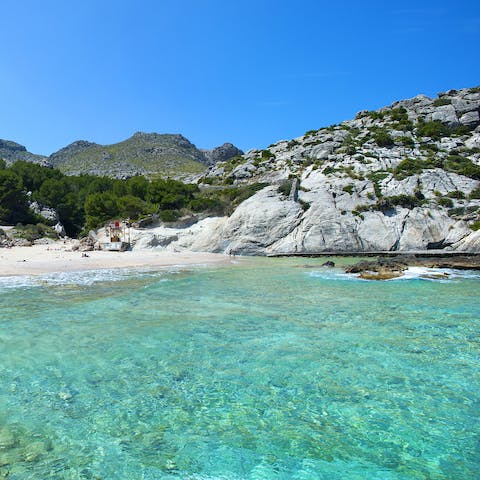 Relax by the sea or enjoy some water sports at Puerto Pollença beach