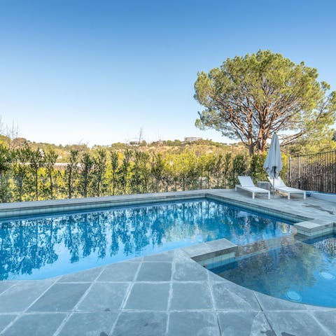 Cool off from the midday Californian sunshine in your glittering pool