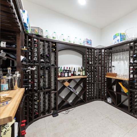 Fix a drink in the huge wine storage and pantry