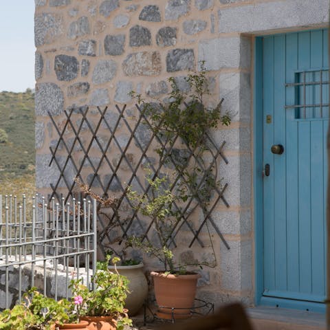Admire the quaint entrance of the traditional villa that you can call home
