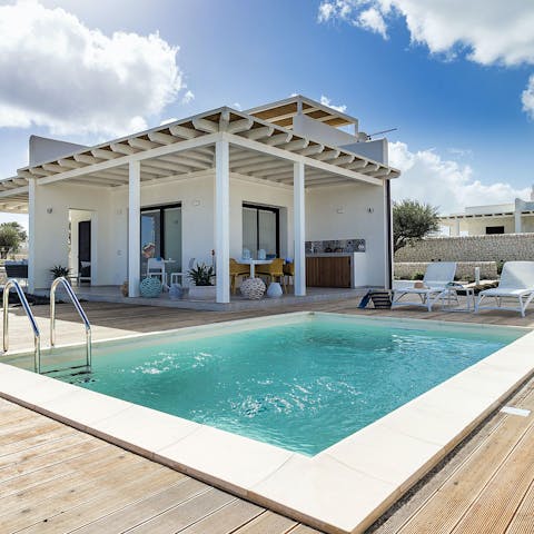 Swim in one of the private pools to cool off in the Sicilian sun