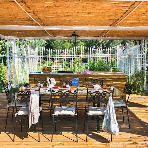 Flex your culinary muscles in the outdoor kitchen and serve up to grateful guests on the terrace
