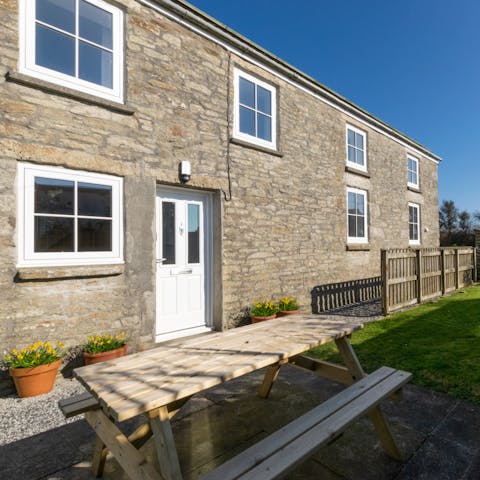Dine outside in the sunny garden
