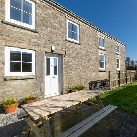 Dine outside in the sunny garden