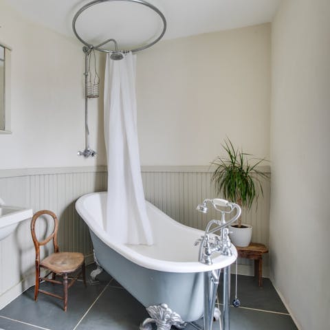 Treat yourself to a soothing soak in the gorgeous freestanding bath