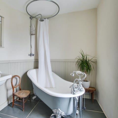 Treat yourself to a soothing soak in the gorgeous freestanding bath