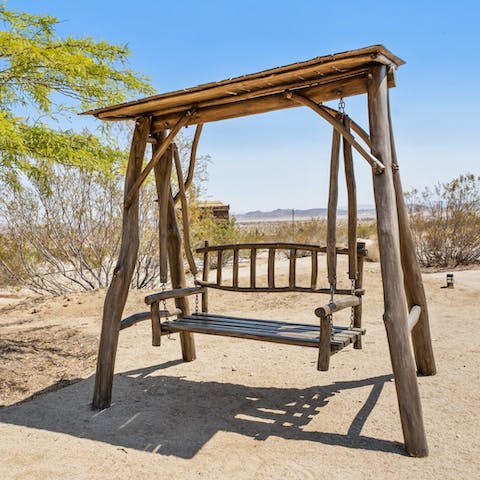 Relax on the swinging chair all afternoon in the sun