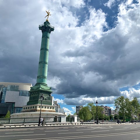 Stroll down to the Place de la Bastille to see the famous July Column monument