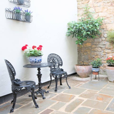 Enjoy your morning coffee in the private patio garden