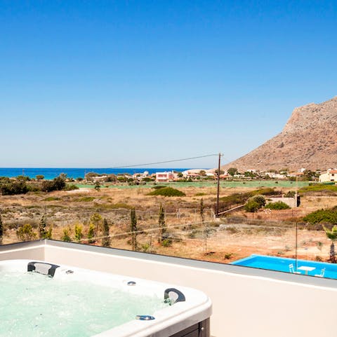 Enjoy hot tub views over the wild Mediterranean landscape