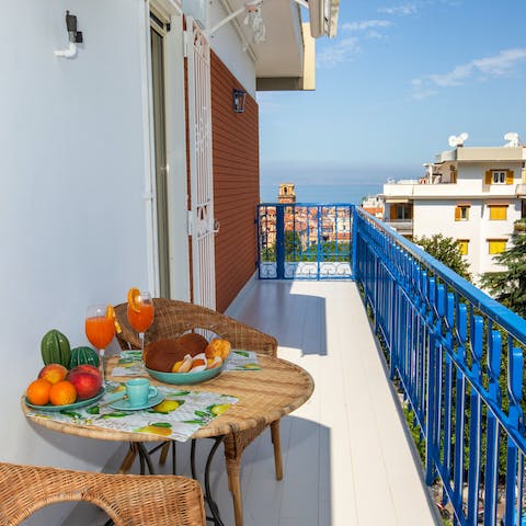 Enjoy the sea views from your peaceful and private balcony, complete with dining table