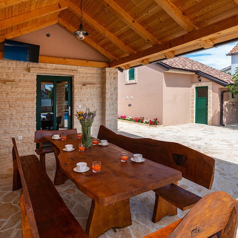 Enjoy family feasts in the outdoor dining area 