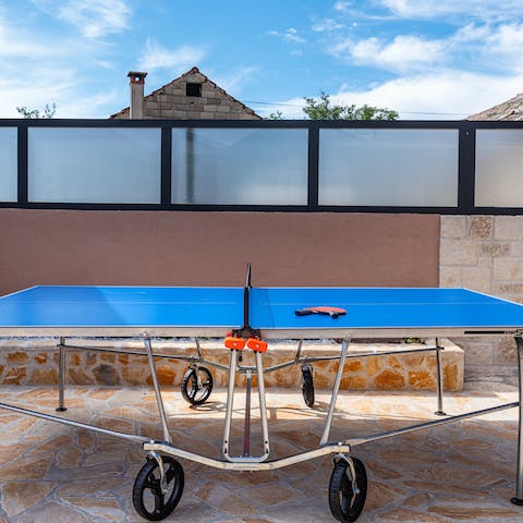 Challenge your loved ones to a round of table tennis 