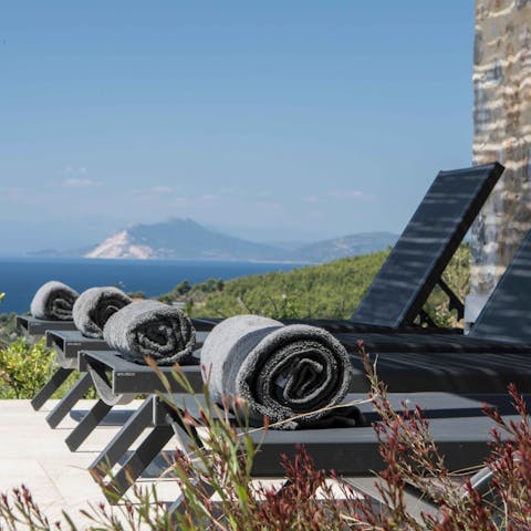 Lounge about by the pool, surrounded by the mythical scenery 