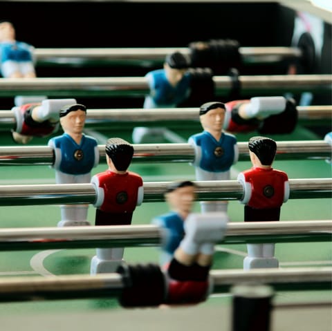 Challenge your friends to a game of foosball in the lounge
