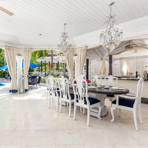 Sit down for a tropical meal at the striking dining table