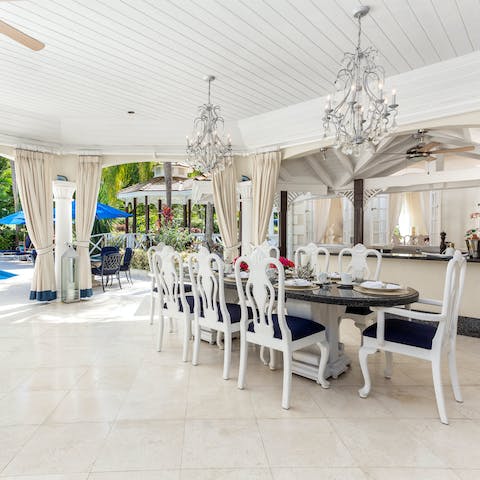 Sit down for a tropical meal at the striking dining table