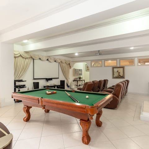 Catch a movie or shoot some pool in the games and cinema room