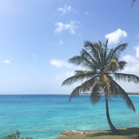 Frolic in the surf at Sandy Lane Beach, only minutes away