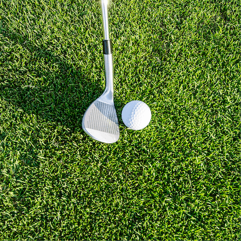 Aim for a hole-in-one with your friends at the nearby Real Club de Golf Guadalmina