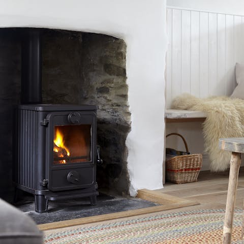 Curl up beside the wood-burner fire 