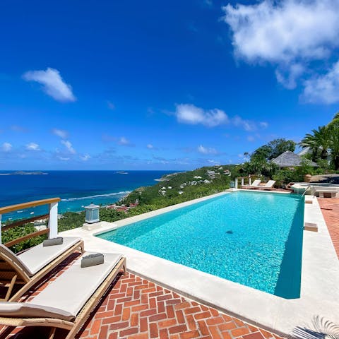 Cool off with a refreshing swim in the private pool with stunning views