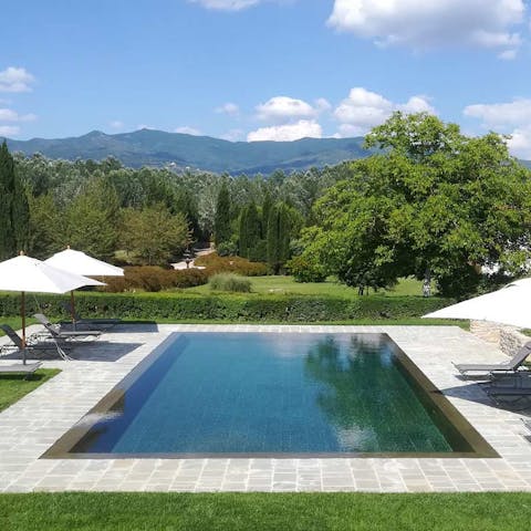 Start the day with a swim overlooking the rolling Tuscan hills