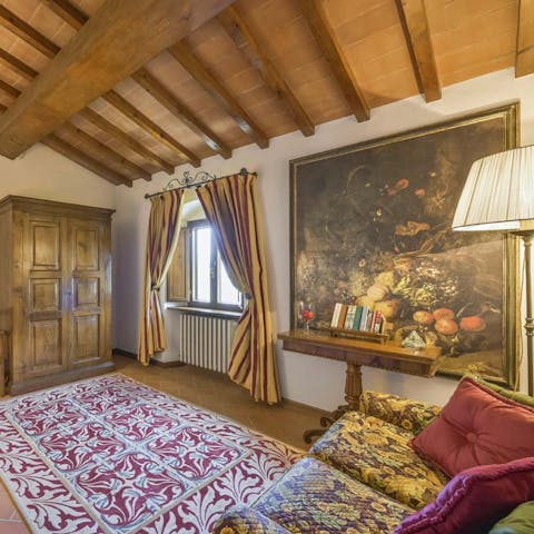 Antique furniture and furnishing and wooden ceilings create a cosy space