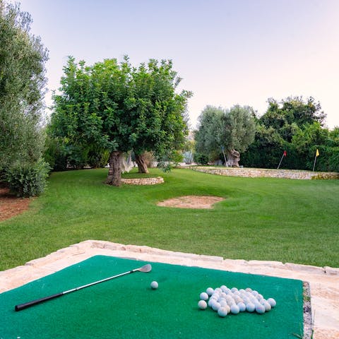 Play a few rounds of mini golf at the on-site course