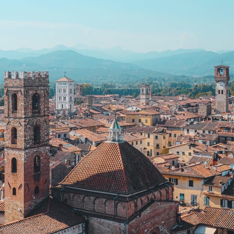 Explore the medieval walled city of Lucca, with the Guinigi Tower under a minute from home