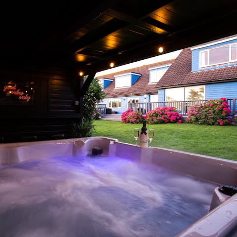 Sit back and relax in the outdoor hot tub