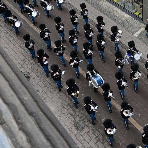 Give a wave to the Danish Royal Guards –⁠ they'll march right by each morning