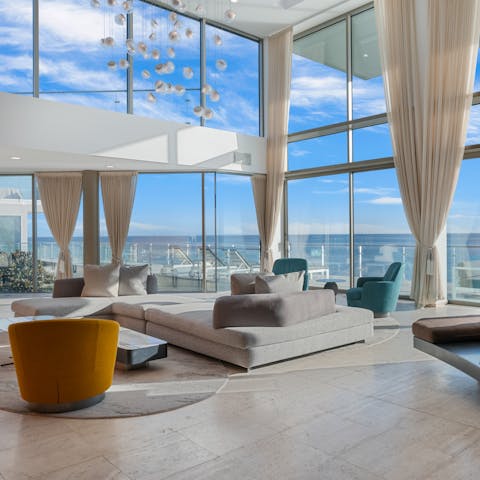 Admire the sea views from the grand living room