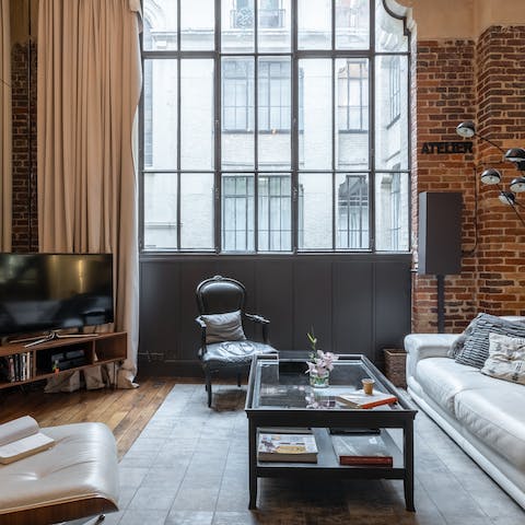 Enjoy the peace and quiet of big windows looking into an internal courtyard