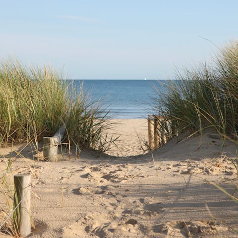 Swim, sail, and hike the long sandy shores reached by the oldest cliff lift in the UK