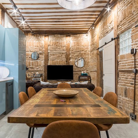 Live and dine surrounded by the industrial-style interiors