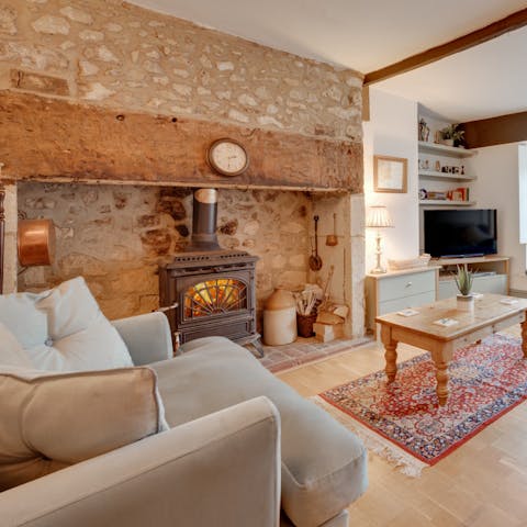 Curl up beside the stove with a good movie on chilly evenings