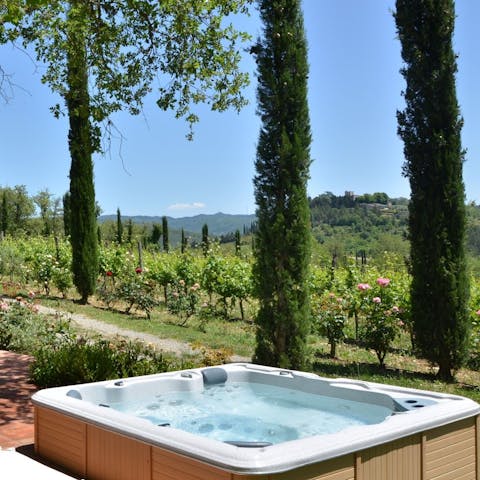 Admire the hilly scenery from the hot tub with a glass of Chianti wine in hand